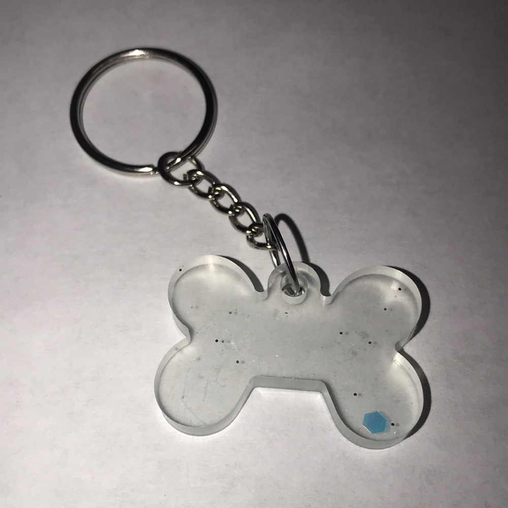 Custom epoxy mini bone 🦴 keychain with glitter ✨